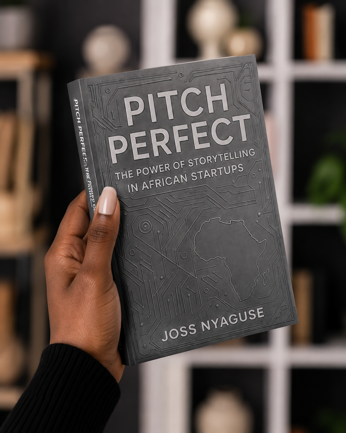 Pitch Perfect held in hand — book by Joss Nyaguse